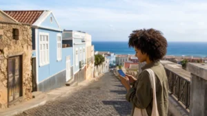 Traveller using mobile internet in Praia, Cape Verde